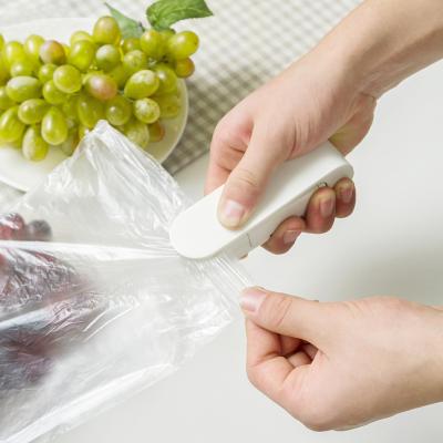 便携两用手压食品零食袋快速封口机--白色