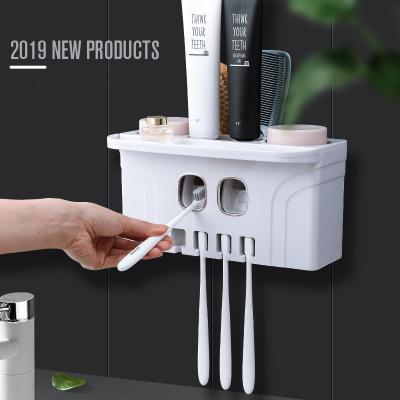无痕壁挂式磁力吸附四杯牙刷架 带双挤牙膏器--粉色（835）